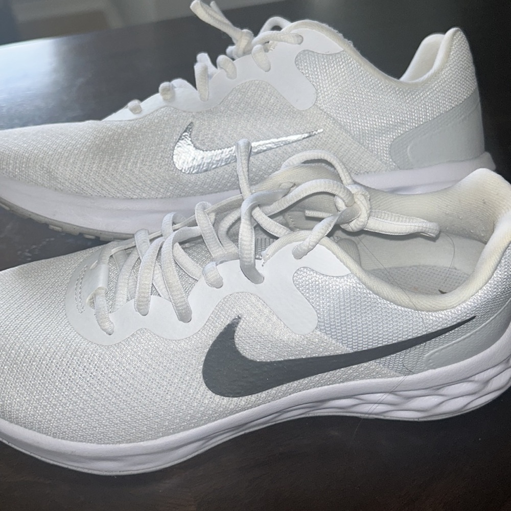 White and silver Nike running sneakers size 9